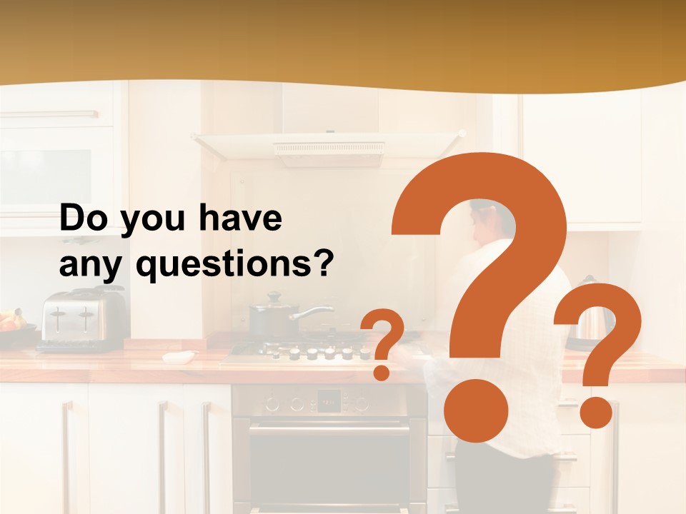 A Man Standing In A Kitchen Next To A Stove Top Oven PowerPoint Template