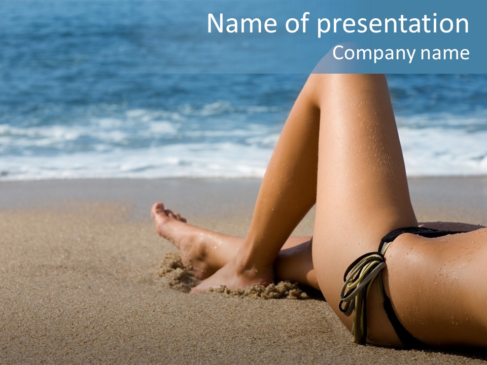 A Woman In A Bikini Laying On The Beach PowerPoint Template