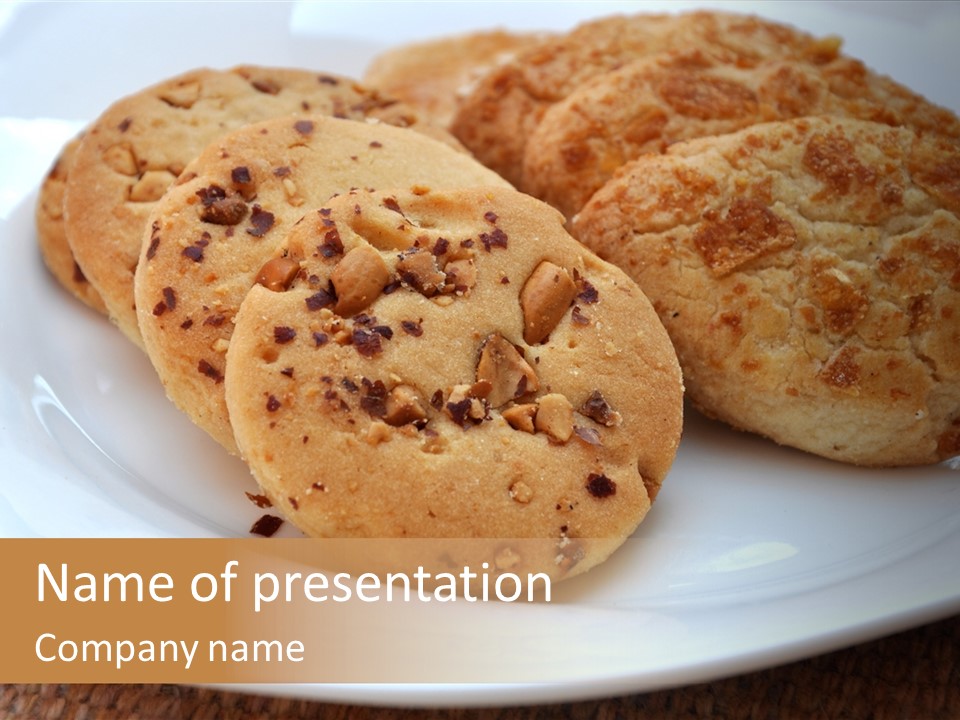 A White Plate Topped With Three Cookies On Top Of A Table PowerPoint Template