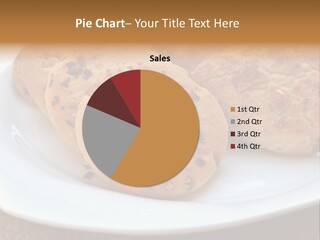 A White Plate Topped With Three Cookies On Top Of A Table PowerPoint Template