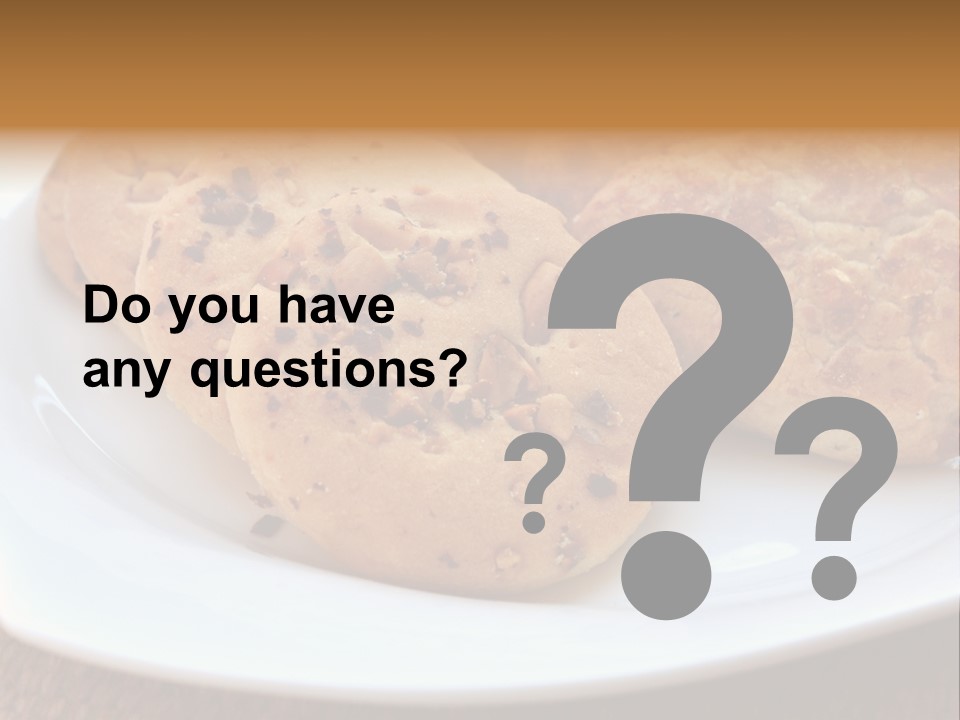 A White Plate Topped With Three Cookies On Top Of A Table PowerPoint Template