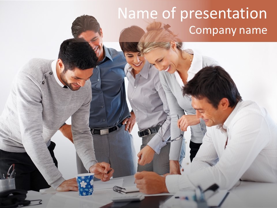 A Group Of People Standing Around A Table PowerPoint Template