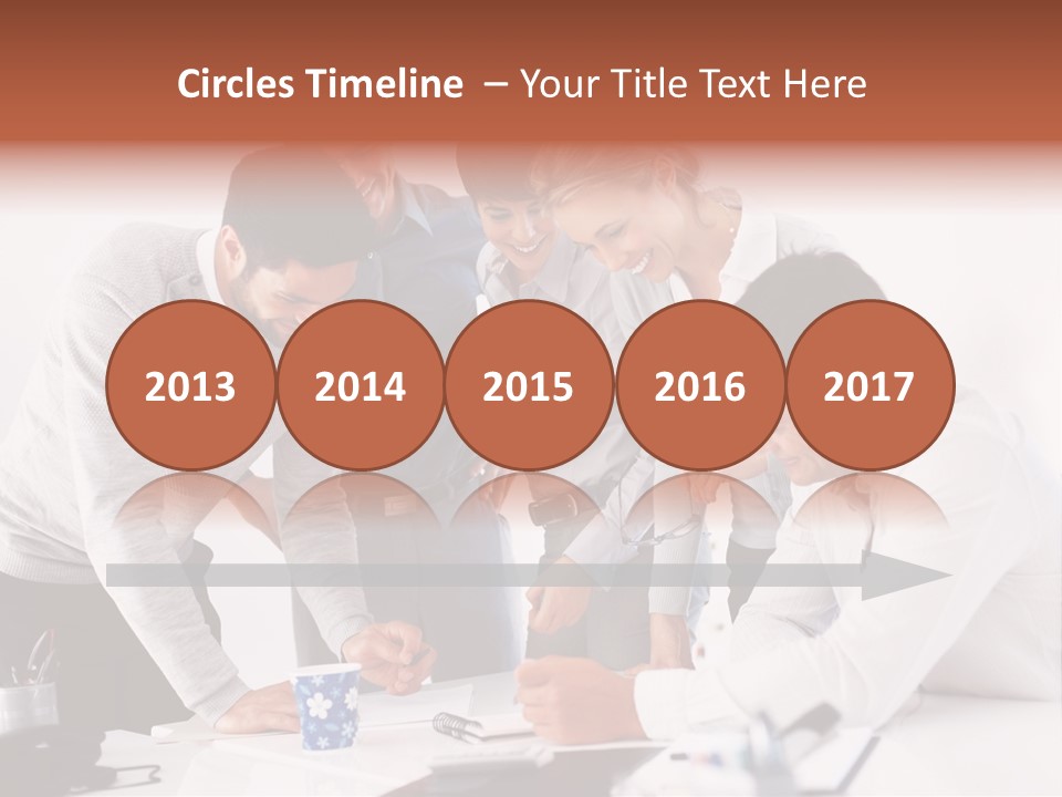 A Group Of People Standing Around A Table PowerPoint Template