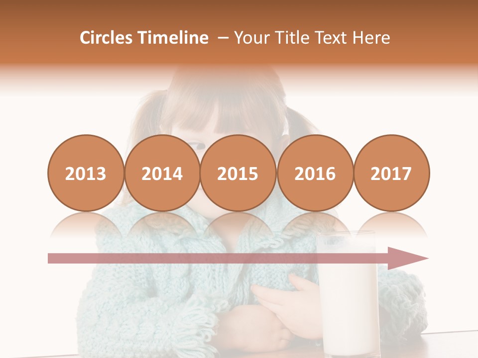 A Little Girl Sitting At A Table With A Glass Of Milk PowerPoint Template