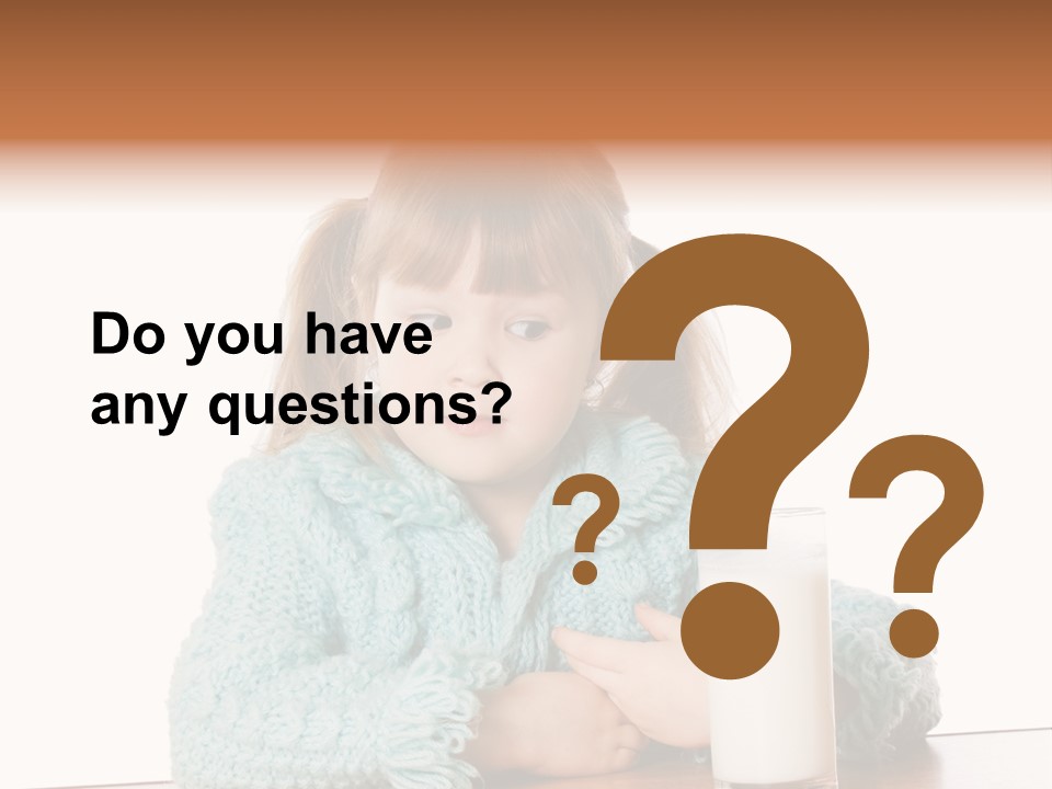 A Little Girl Sitting At A Table With A Glass Of Milk PowerPoint Template
