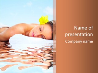 A Woman Laying Down In The Water With A Yellow Flower On Her Head PowerPoint Template