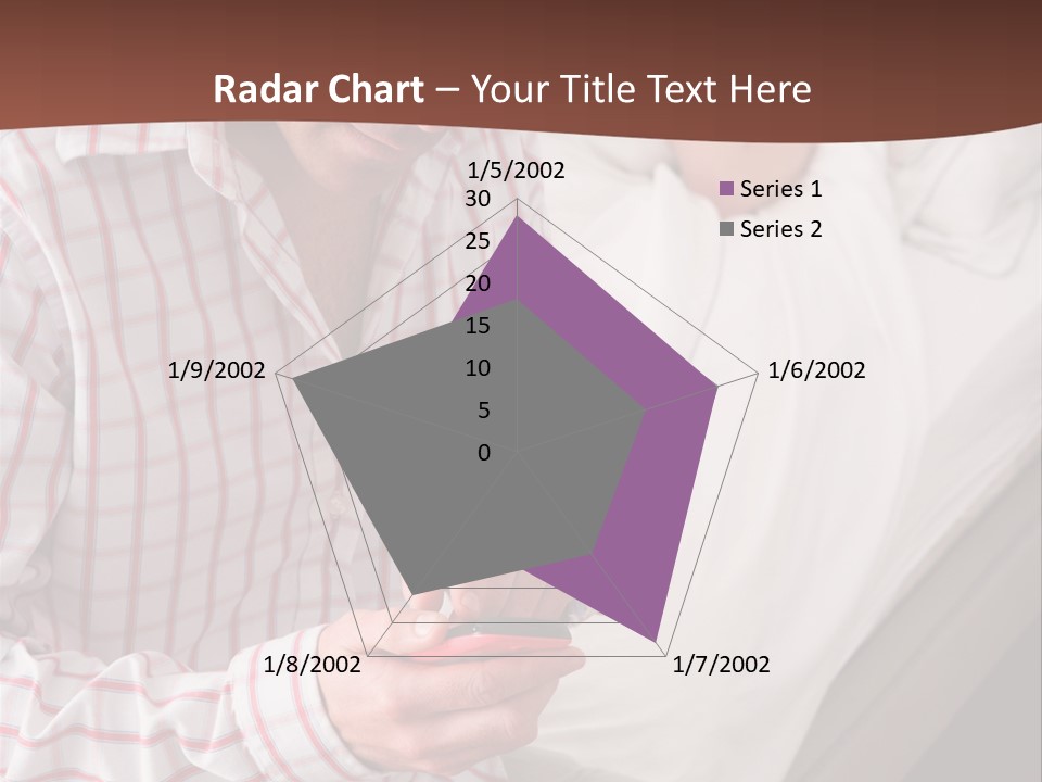 A Man Sitting On A Bed Looking At His Cell Phone PowerPoint Template