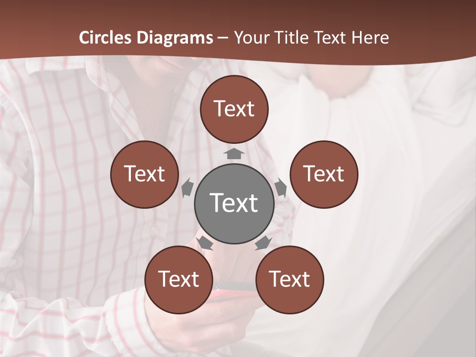 A Man Sitting On A Bed Looking At His Cell Phone PowerPoint Template