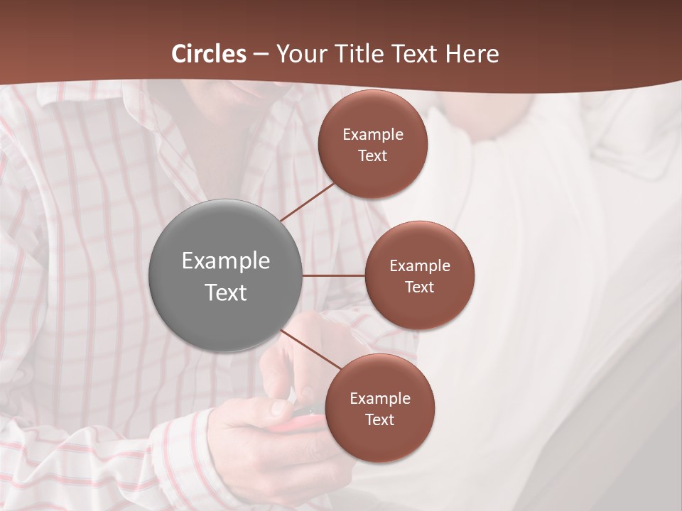 A Man Sitting On A Bed Looking At His Cell Phone PowerPoint Template