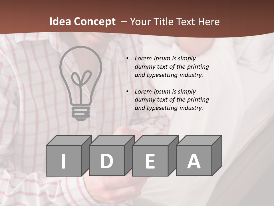 A Man Sitting On A Bed Looking At His Cell Phone PowerPoint Template