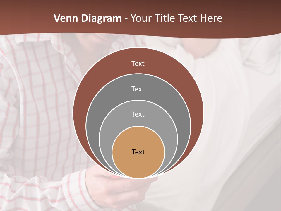A Man Sitting On A Bed Looking At His Cell Phone PowerPoint Template