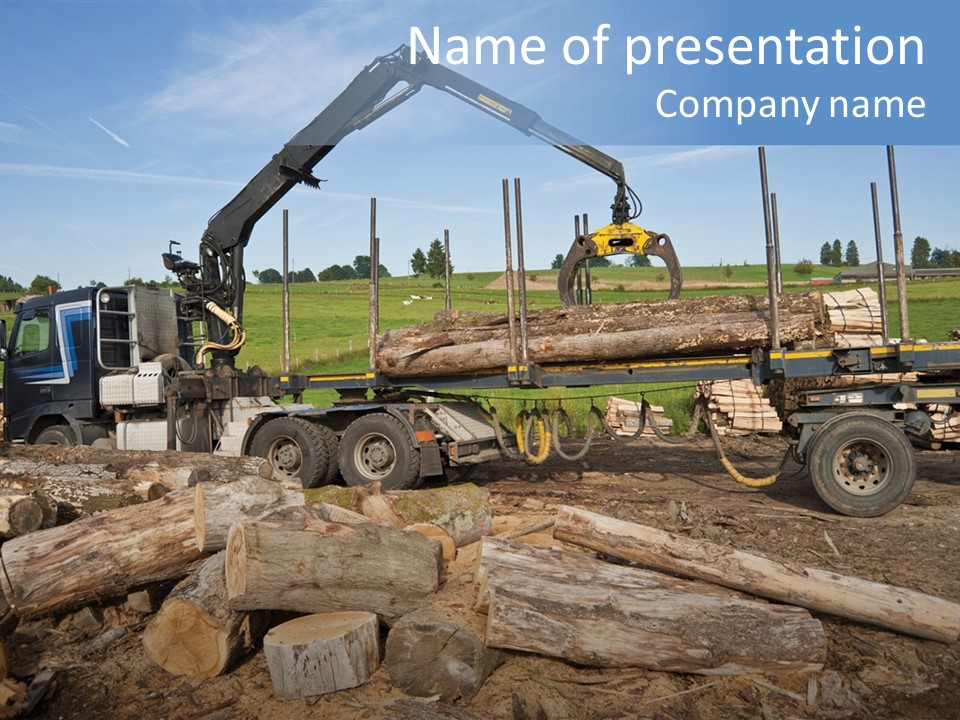 A Large Truck With Logs On The Back Of It PowerPoint Template