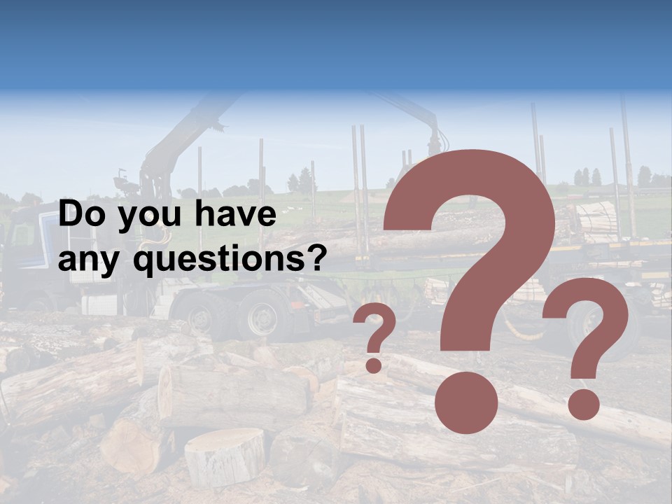 A Large Truck With Logs On The Back Of It PowerPoint Template