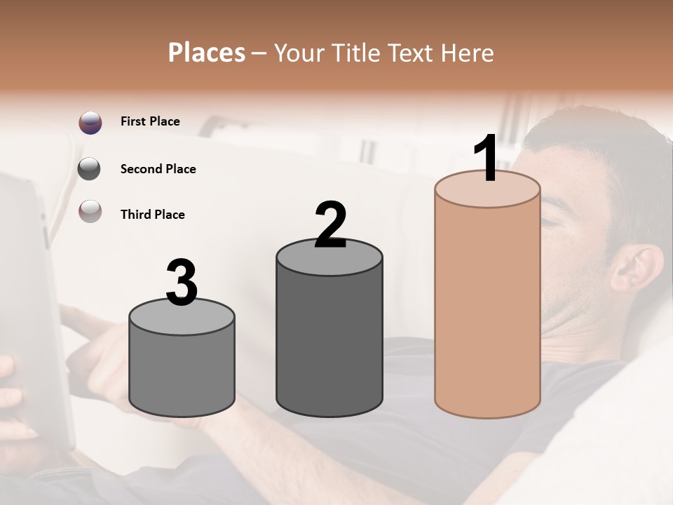 A Man Sitting On A Couch Looking At A Tablet PowerPoint Template