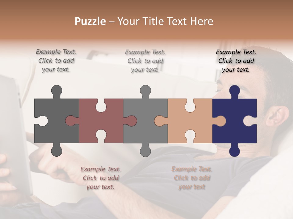 A Man Sitting On A Couch Looking At A Tablet PowerPoint Template