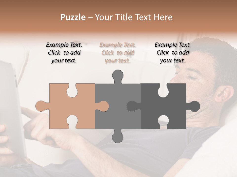 A Man Sitting On A Couch Looking At A Tablet PowerPoint Template