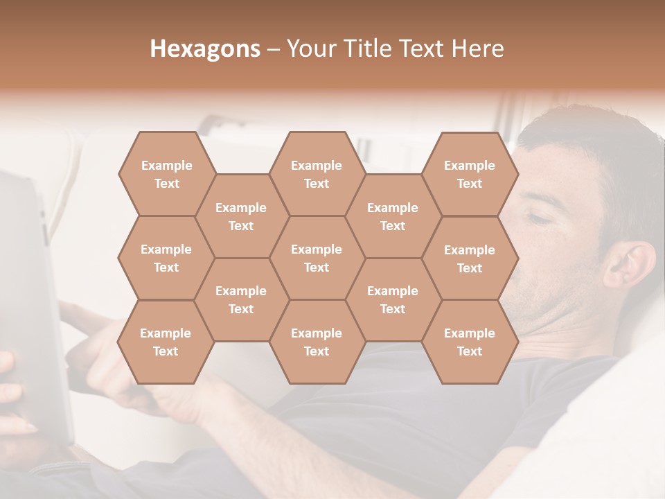 A Man Sitting On A Couch Looking At A Tablet PowerPoint Template