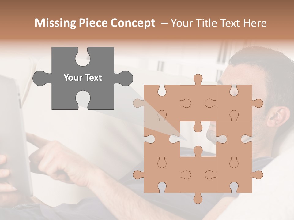 A Man Sitting On A Couch Looking At A Tablet PowerPoint Template