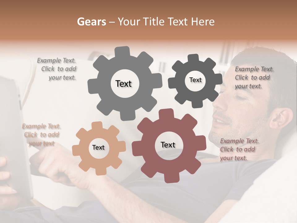 A Man Sitting On A Couch Looking At A Tablet PowerPoint Template