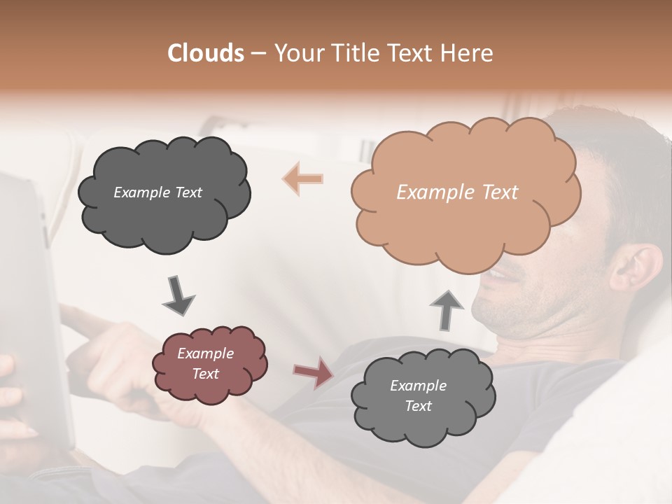 A Man Sitting On A Couch Looking At A Tablet PowerPoint Template