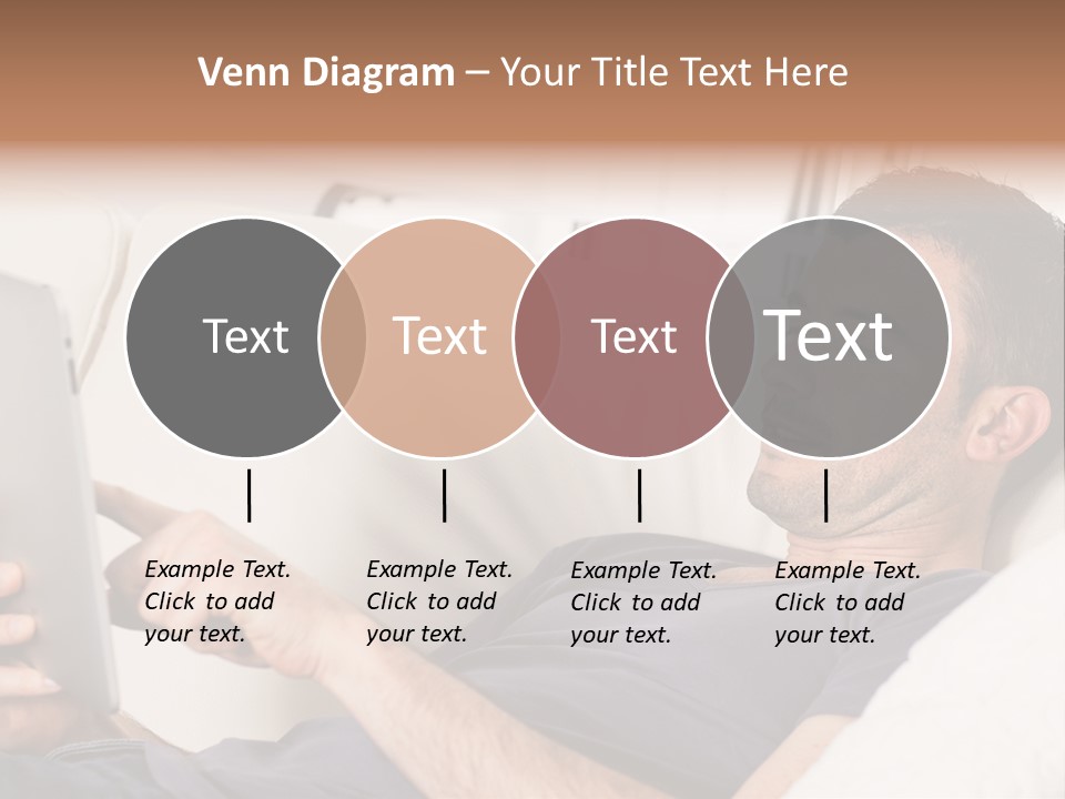 A Man Sitting On A Couch Looking At A Tablet PowerPoint Template