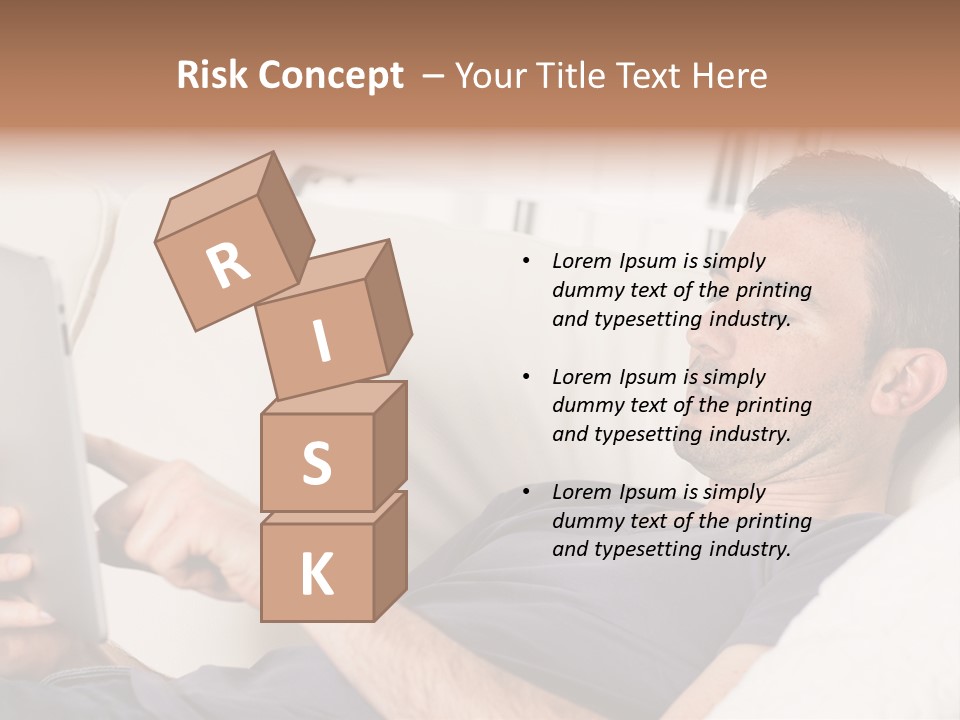 A Man Sitting On A Couch Looking At A Tablet PowerPoint Template