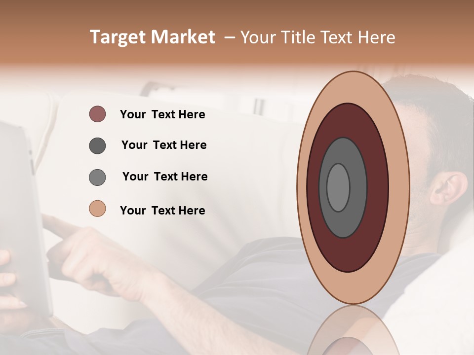 A Man Sitting On A Couch Looking At A Tablet PowerPoint Template