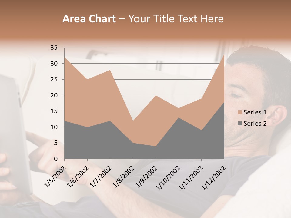 A Man Sitting On A Couch Looking At A Tablet PowerPoint Template