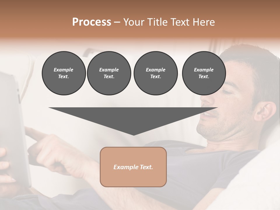 A Man Sitting On A Couch Looking At A Tablet PowerPoint Template