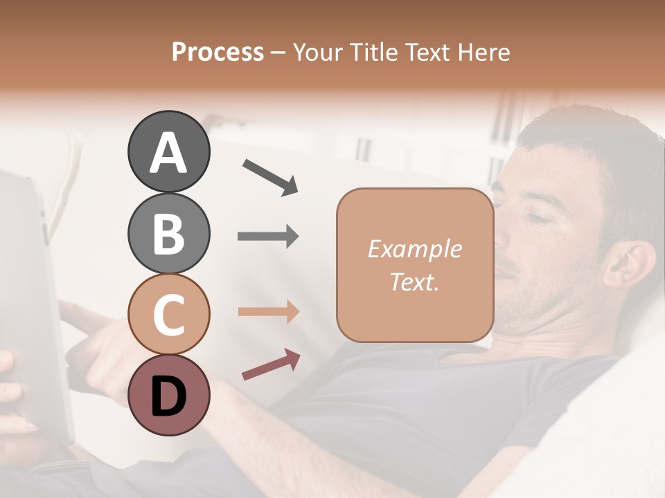 A Man Sitting On A Couch Looking At A Tablet PowerPoint Template