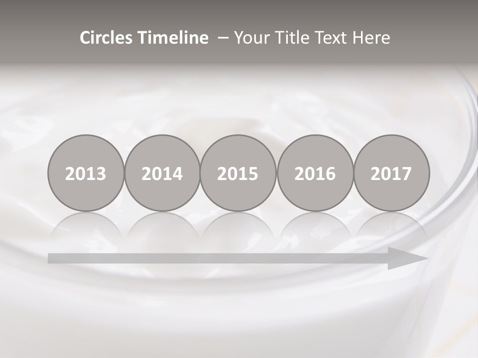 A Glass Of Yogurt With A Spoon In It PowerPoint Template