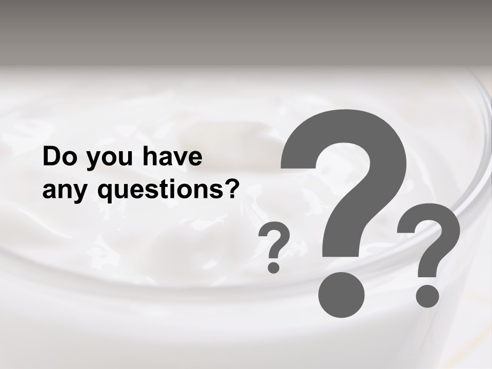 A Glass Of Yogurt With A Spoon In It PowerPoint Template