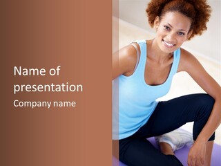 A Woman Sitting On A Yoga Mat In A Room PowerPoint Template