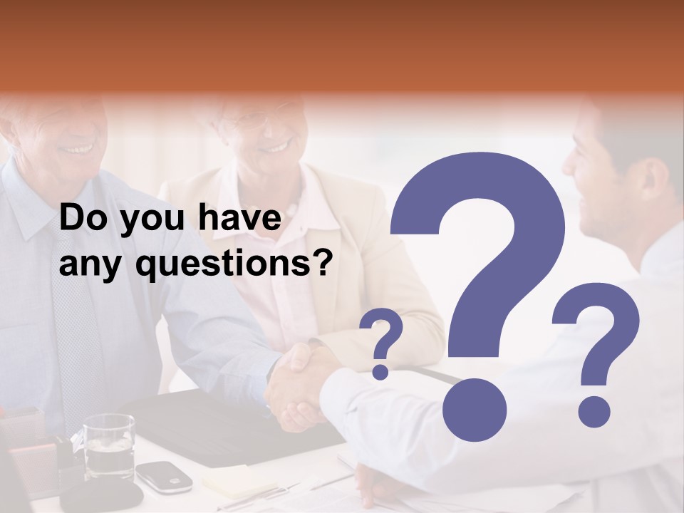 A Group Of People Shaking Hands At A Table PowerPoint Template