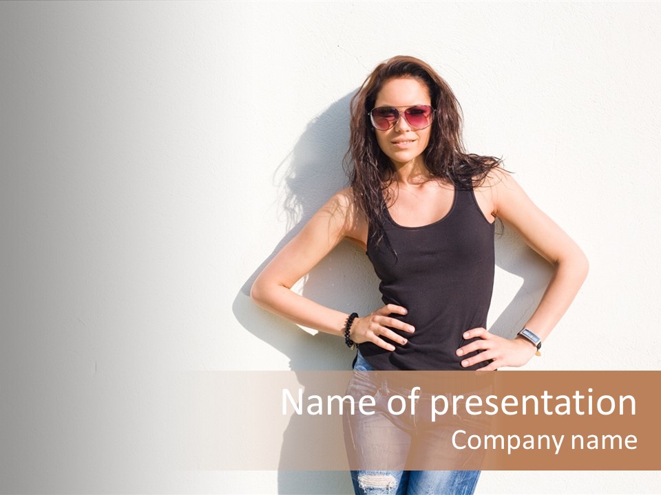 A Woman In A Black Tank Top Is Standing With Her Hands On Her Hips PowerPoint Template