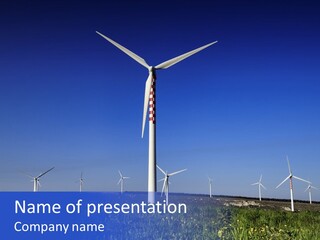 A Wind Farm With Windmills In The Background PowerPoint Template
