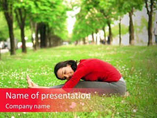 A Woman In A Red Shirt Is Sitting In The Grass PowerPoint Template