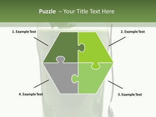 A Green Smoothie In A Glass With A Leaf On Top PowerPoint Template