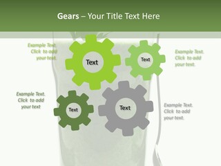A Green Smoothie In A Glass With A Leaf On Top PowerPoint Template