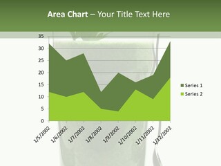 A Green Smoothie In A Glass With A Leaf On Top PowerPoint Template