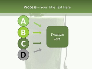 A Green Smoothie In A Glass With A Leaf On Top PowerPoint Template