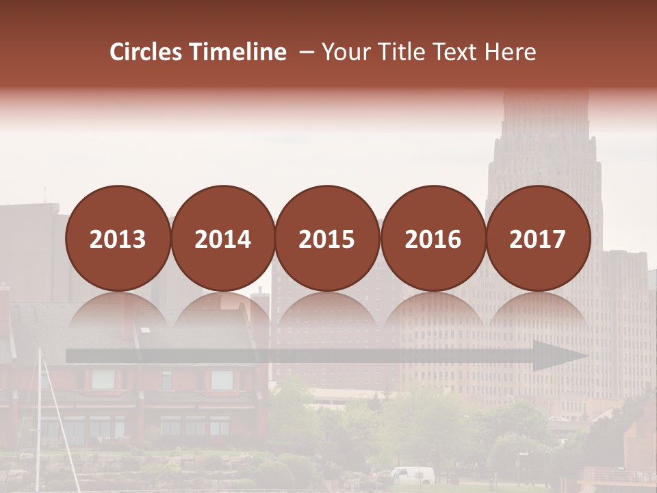 A Picture Of A City With A Large Building In The Background PowerPoint Template