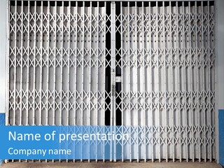 A Blue And White Wall With A Metal Gate PowerPoint Template