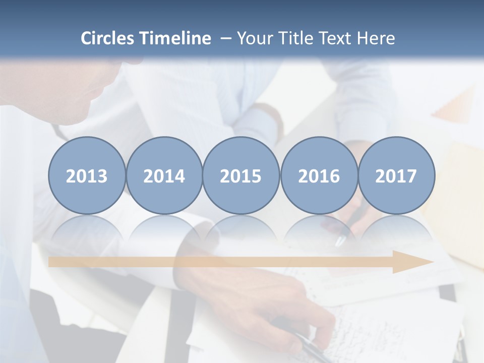 A Couple Of People Sitting At A Table With Papers PowerPoint Template