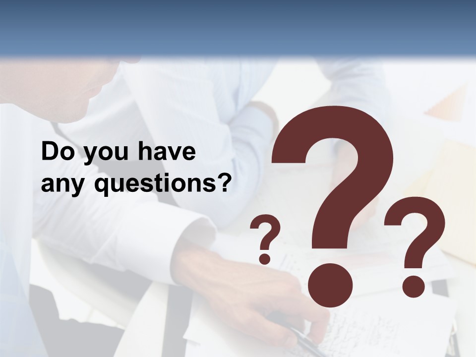 A Couple Of People Sitting At A Table With Papers PowerPoint Template