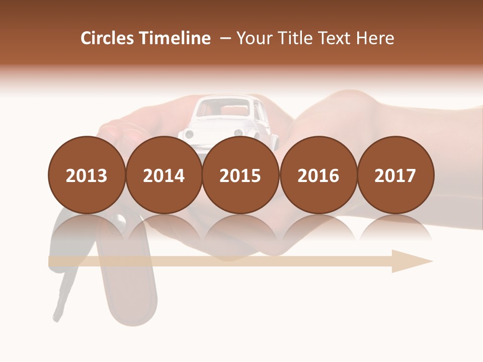 A Person Holding A Car Key In Their Hand PowerPoint Template