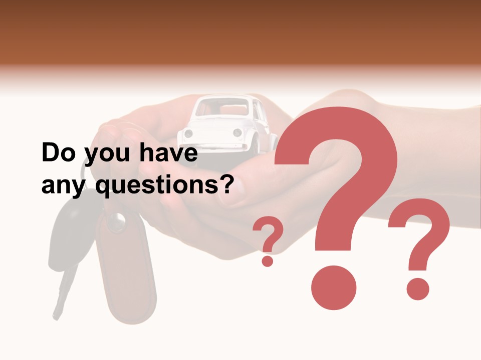 A Person Holding A Car Key In Their Hand PowerPoint Template