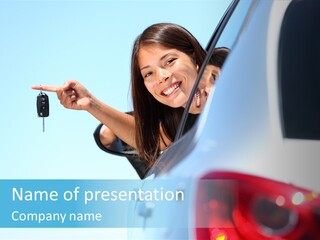 A Woman Holding A Car Key In Her Hand PowerPoint Template