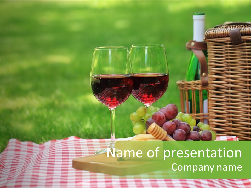 Two Glasses Of Wine On A Picnic Table PowerPoint Template