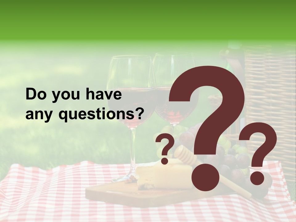 Two Glasses Of Wine On A Picnic Table PowerPoint Template